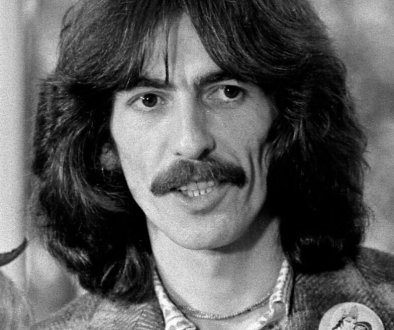 George_Harrison_1974_(cropped)